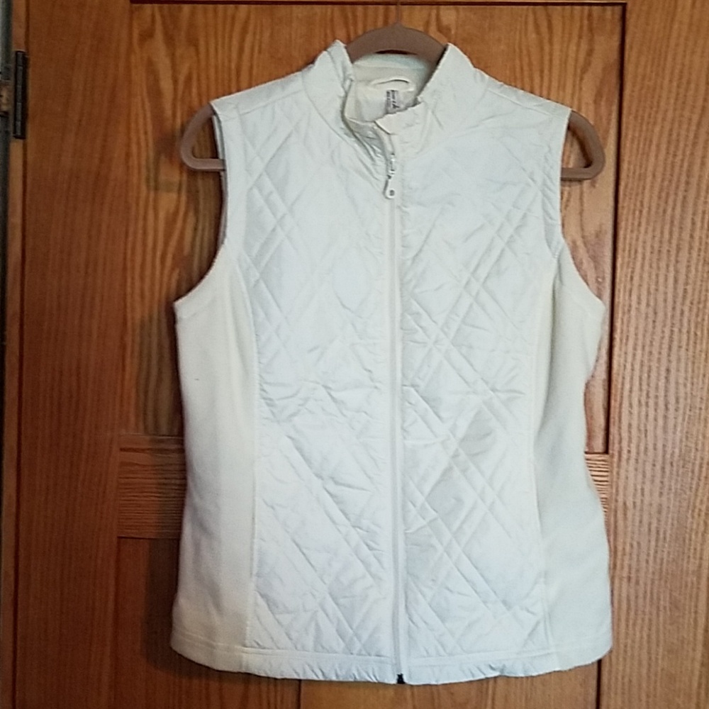 Like new only worn a couple times white vest!